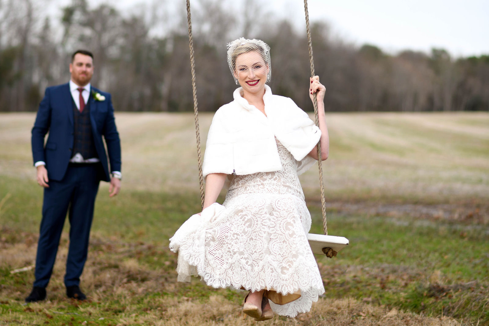 Sample wedding photograph — bride on a swing